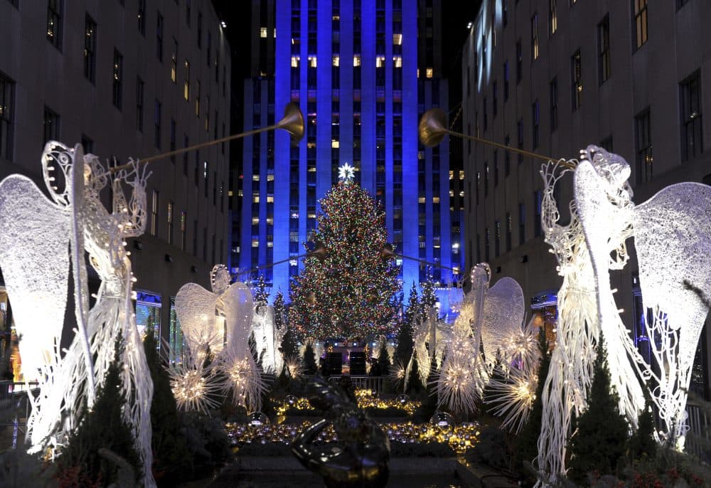 The Rockefeller Center Christmas Tree stands lit, Wednesday, Nov. 29, 2017, in New York. The 75-foot tall Norway spruce is covered with more than 50,000 multi-colored LED lights and will remain lit until Jan. 7, 2018. (Diane Bondareff/AP)