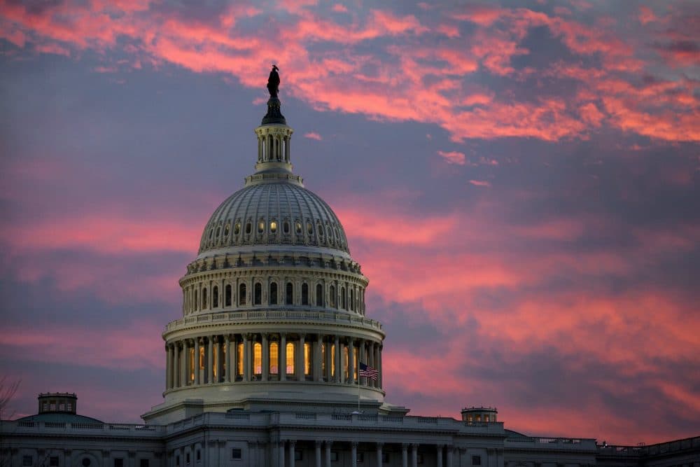The Capitol is seen at dawn as Senate Republicans work to pass their sweeping tax bill this week, in Washington, Thursday, Nov. 30, 2017. (J. Scott Applewhite/AP)