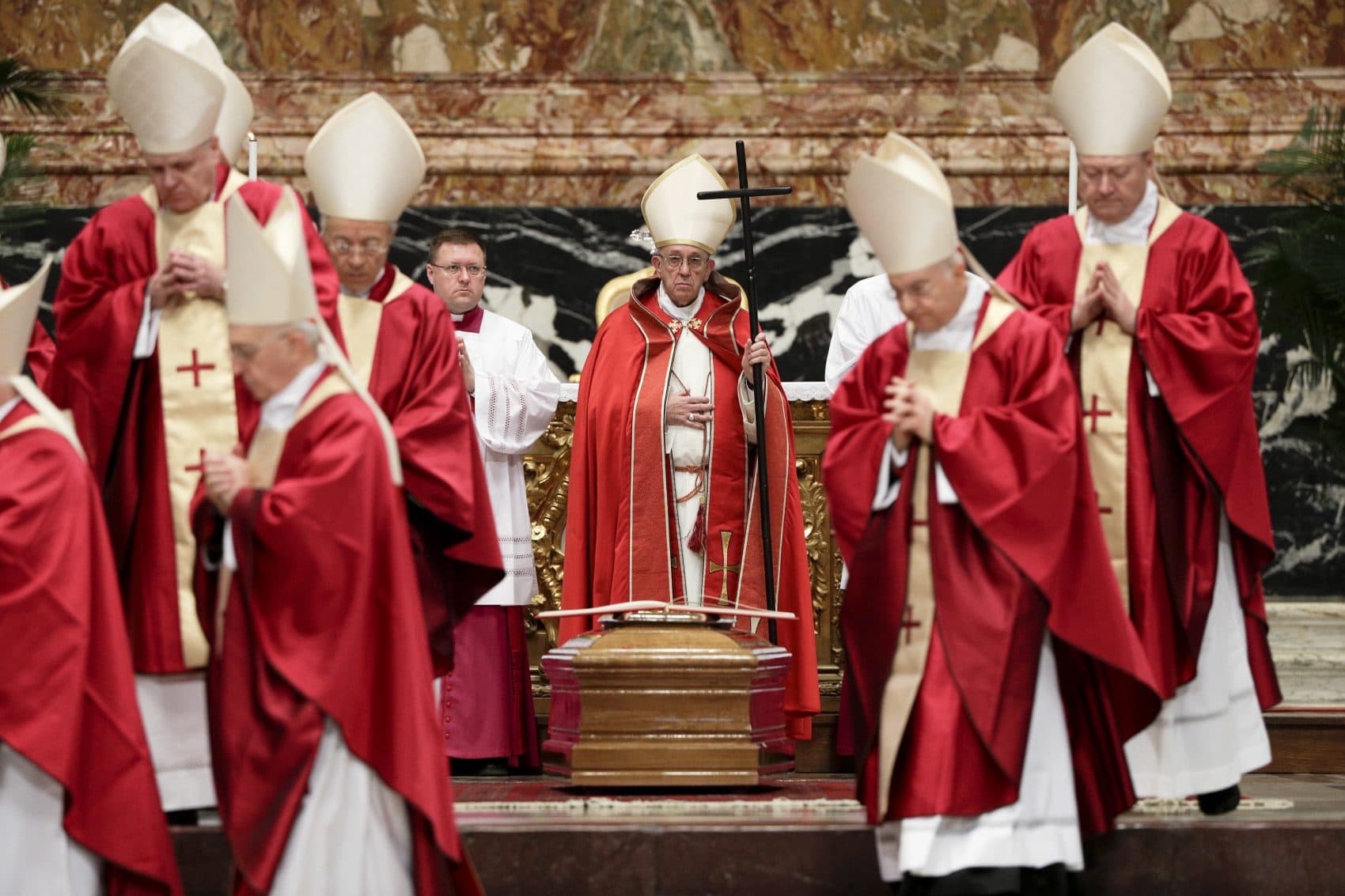 Pope Francis presides over the funeral ceremony for late Cardinal Bernard Law, in St. Peter's Basilica at the Vatican, Thursday, Dec. 21, 2017. Law, who died Wednesday at age 86, resigned in disgrace as archbishop of Boston in 2002 after revelations that he covered up for dozens of priests who raped and sexually molested children, moving them to different parishes without telling parents or police. (Gregorio Borgia/AP)