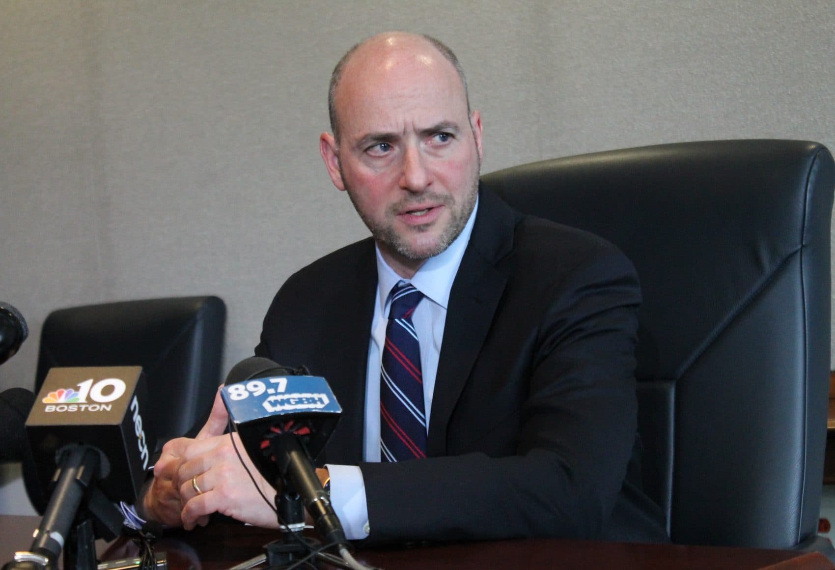 U.S. Attorney Andrew Lelling sits down with members of the media in his office Wednesday. (Sam Doran/State House News Service)