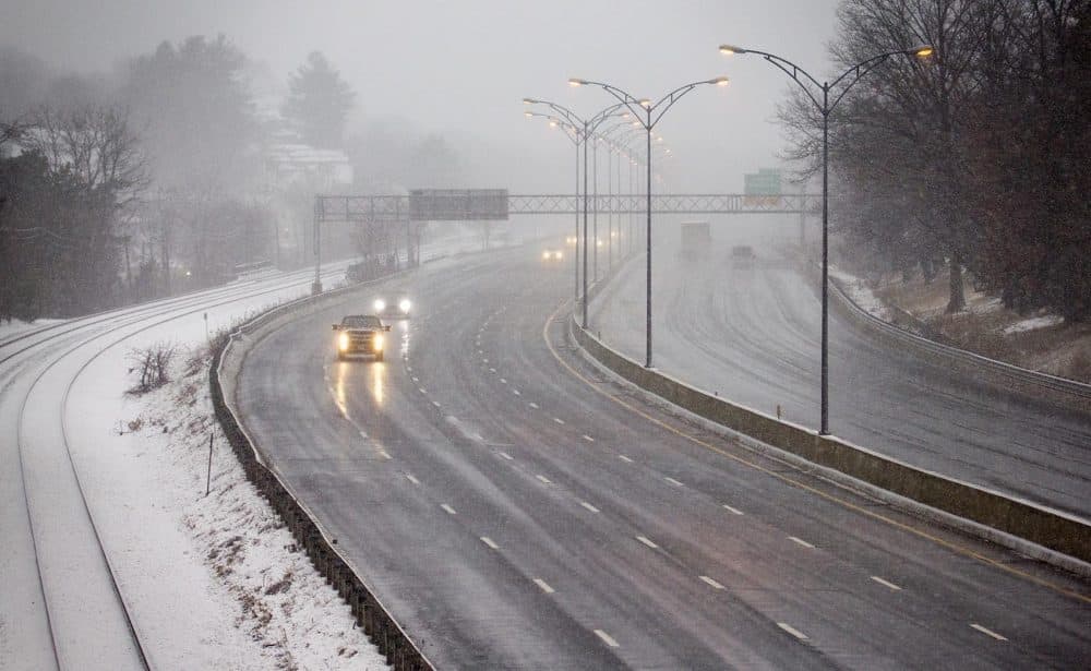 Light traffic on the Mass. Pike at rush hour as a snowstorm approaches Boston. (Robin Lubbock/WBUR)