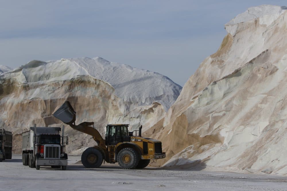 Road salt was loaded into trucks at Eastern Minerals Inc. on Wednesday in Chelsea, Mass. The National Weather Service has issued a blizzard warning for Thursday that extends from Block Island, R.I., north to coastal Maine. (Bill Sikes/AP)