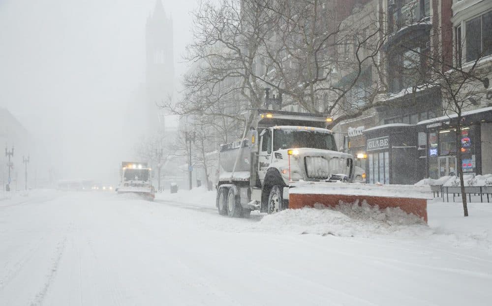 Snow plows clear Boylston Street at the height of the storm. (Robin Lubbock/WBUR)