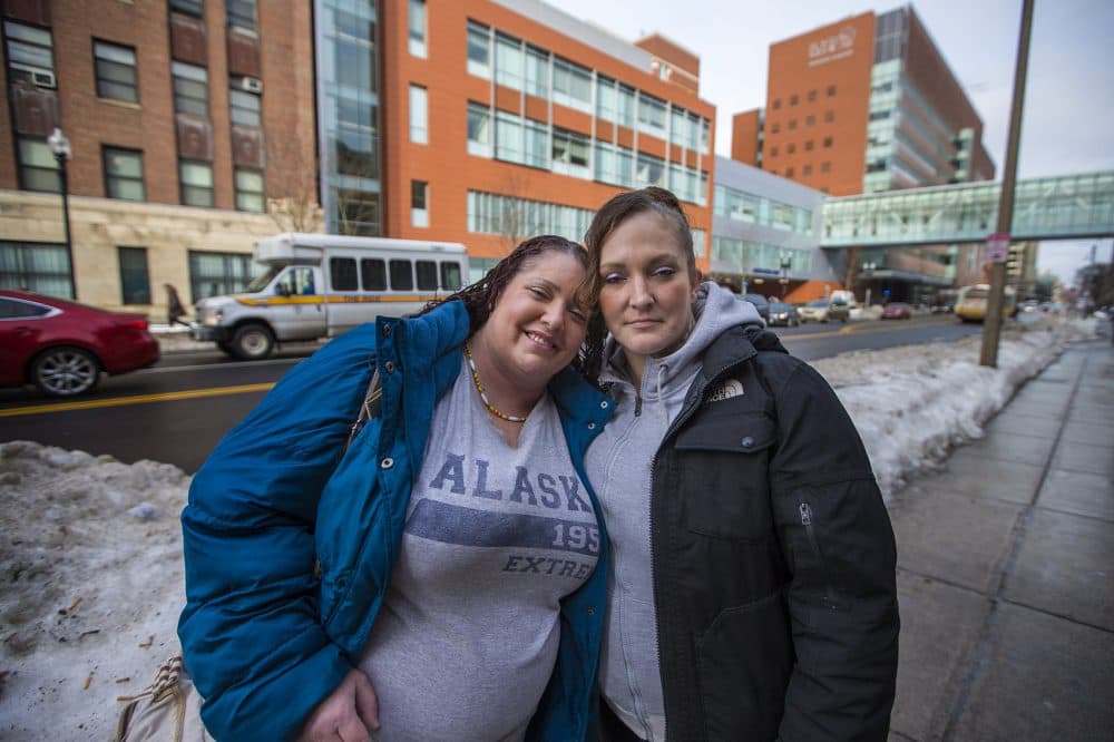 Anna, left, and Nichole on Albany Street in front of Boston Health Care for the Homeless. (Jesse Costa/WBUR)