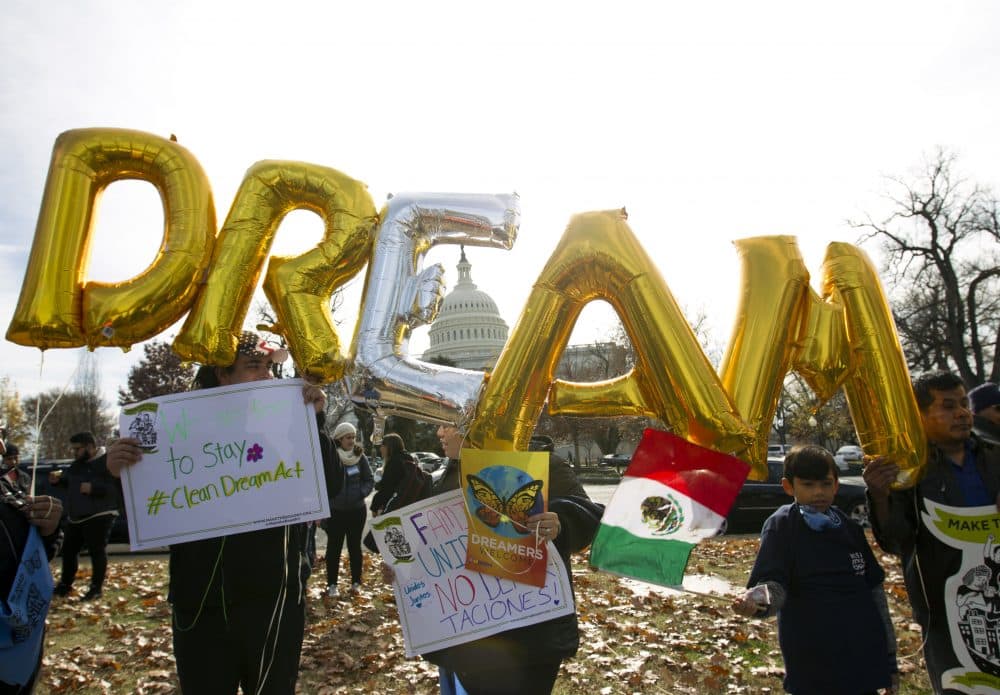 In this Dec. 6, 2017, file photo, demonstrators hold up balloons during an immigration rally in support of the Deferred Action for Childhood Arrivals (DACA), and Temporary Protected Status (TPS), programs, near the U.S. Capitol in Washington. Casting a cloud over already tenuous negotiations, President Trump said Sunday, Jan. 14, 2018, that DACA, a program that protects immigrants who were brought to the U.S. as children and live here illegally, is “probably dead” and blamed Democrats, days before some government functions would start shutting down unless a deal is reached. (Jose Luis Magana/AP)