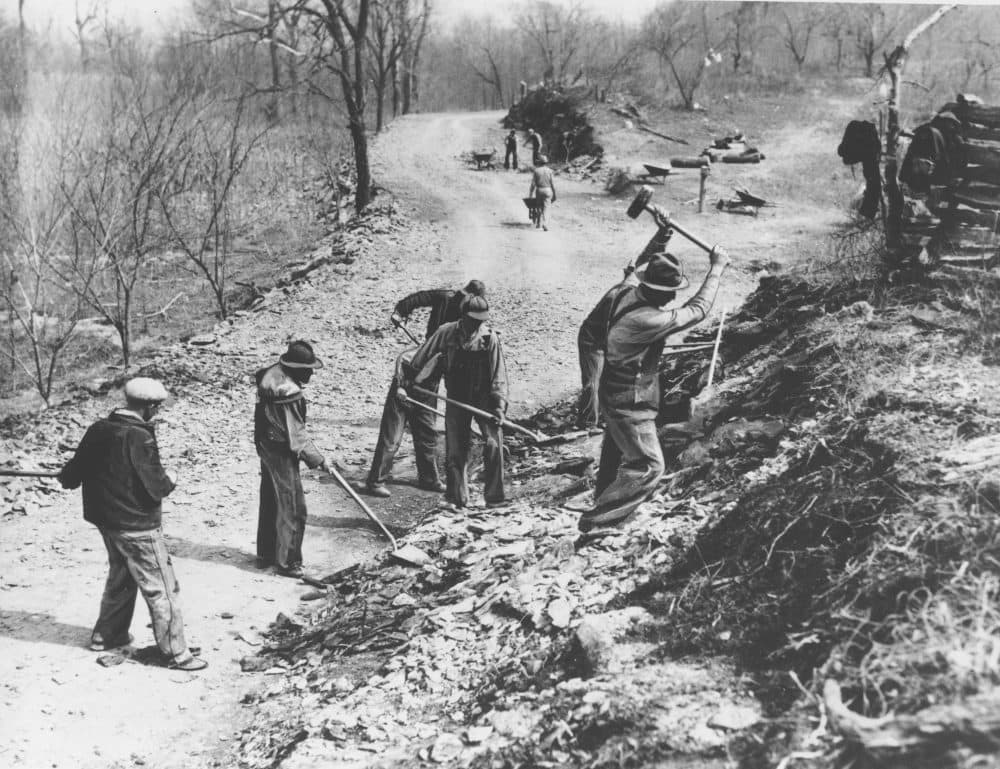 Works Progress Administration workers build a new farm-to-market road along Knob Creek in Tennessee, March 9, 1936. (AP Photo)