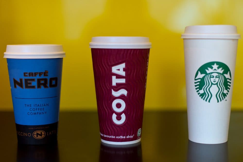A grande Cafe Nero, large Costa Coffee and venti-sized Starbucks cups in London. (Ben Pruchnie/Getty Images)