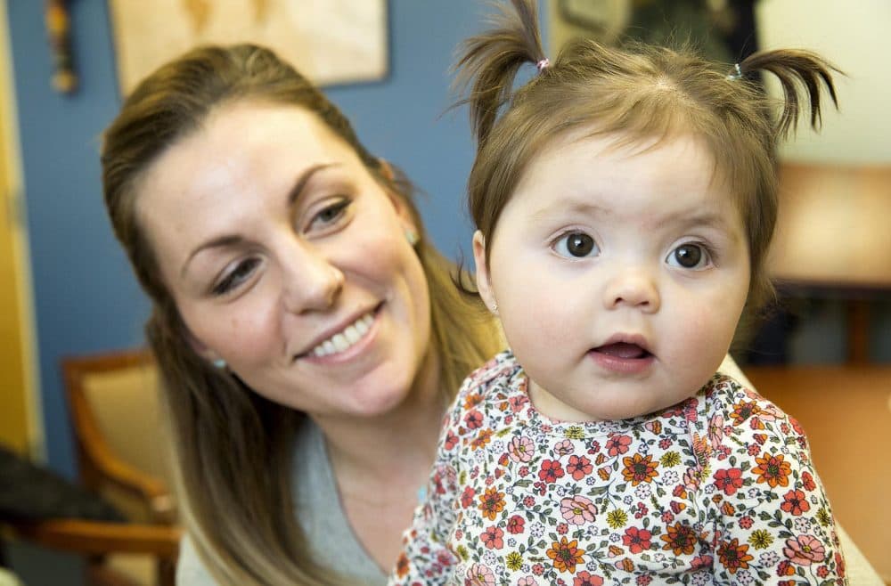 10-month-old Harper Rose with her mother Caitlin Gillespie. (Robin Lubbock/WBUR)