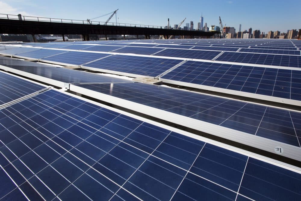 In this Feb. 14, 2017, file photo, a rooftop is covered with solar panels at the Brooklyn Navy Yard, in New York. (Mark Lennihan, File/AP)