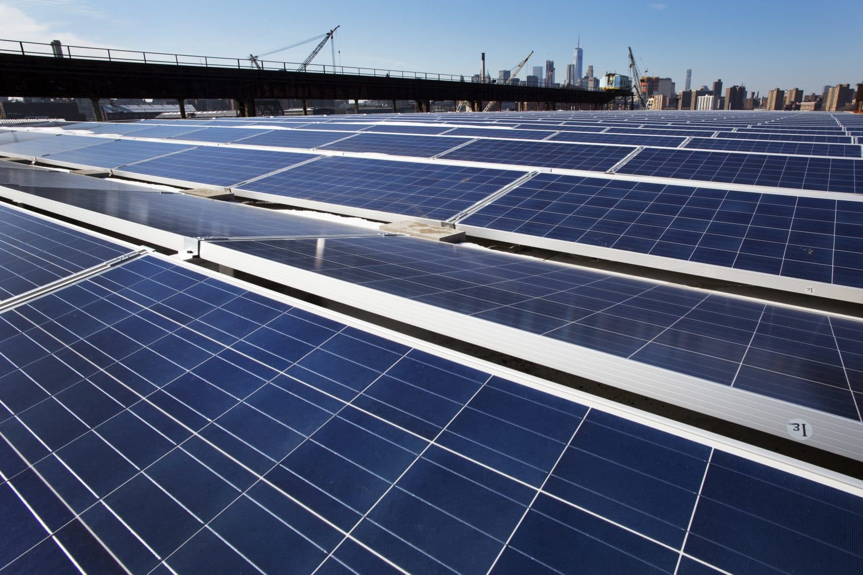 In this Feb. 14, 2017, file photo, a rooftop is covered with solar panels at the Brooklyn Navy Yard, in New York. (Mark Lennihan, File/AP)