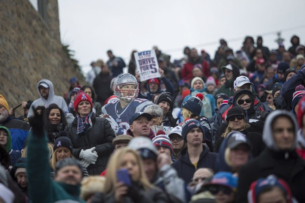 Fans gather outside of Gillette Stadium to send off the Patriots to the Super Bowl. (Jesse Costa/WBUR)