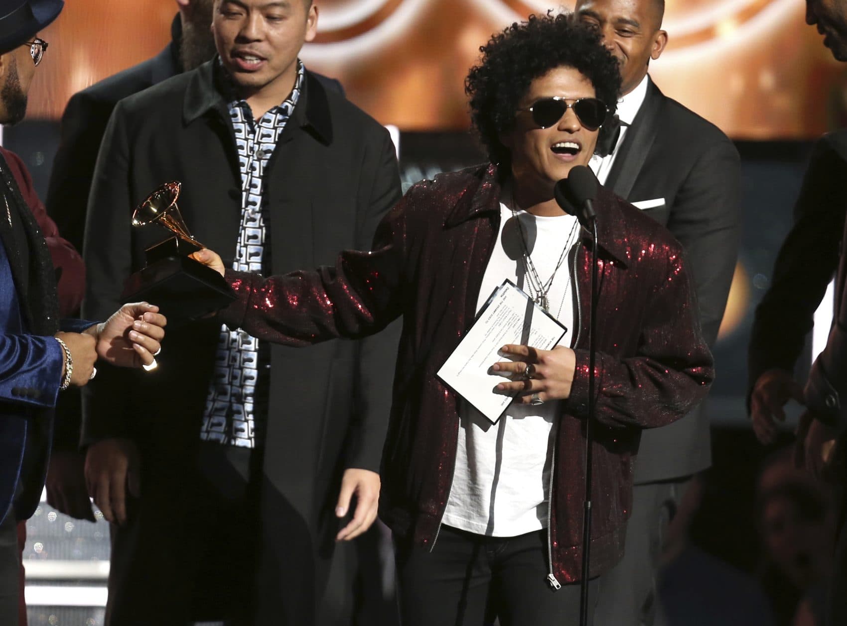 Bruno Mars accepts the award for song of the year for &quot;That's What I Like&quot; at the 60th annual Grammy Awards at Madison Square Garden on Sunday, Jan. 28, 2018, in New York. (Matt Sayles/Invision/AP)