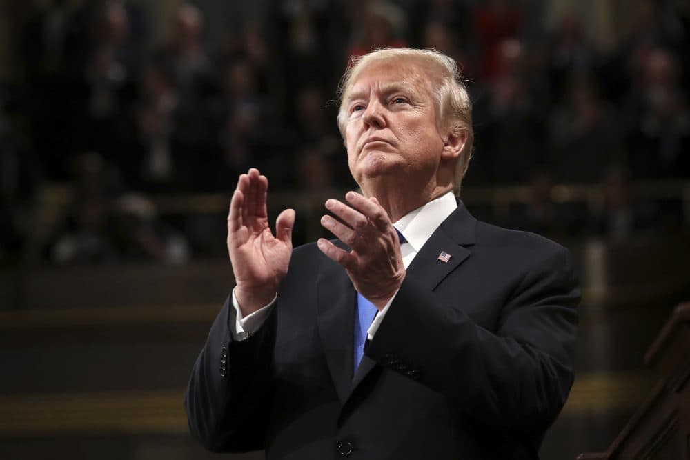 President Trump claps during the State of the Union address on Jan. 30, 2018 in Washington. (Win McNamee/AP)