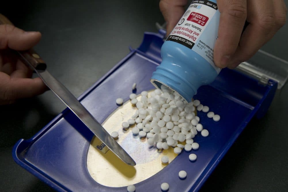 In this Friday, July 8, 2016, photo, pharmacist technician Irene Arrenquin fills a prescription for the anti-diarrhea drug diphenoxylate hydrochloride and atropine sulfate at Pucci's Pharmacy, in Sacramento, Calif. (Rich Pedroncelli/AP)