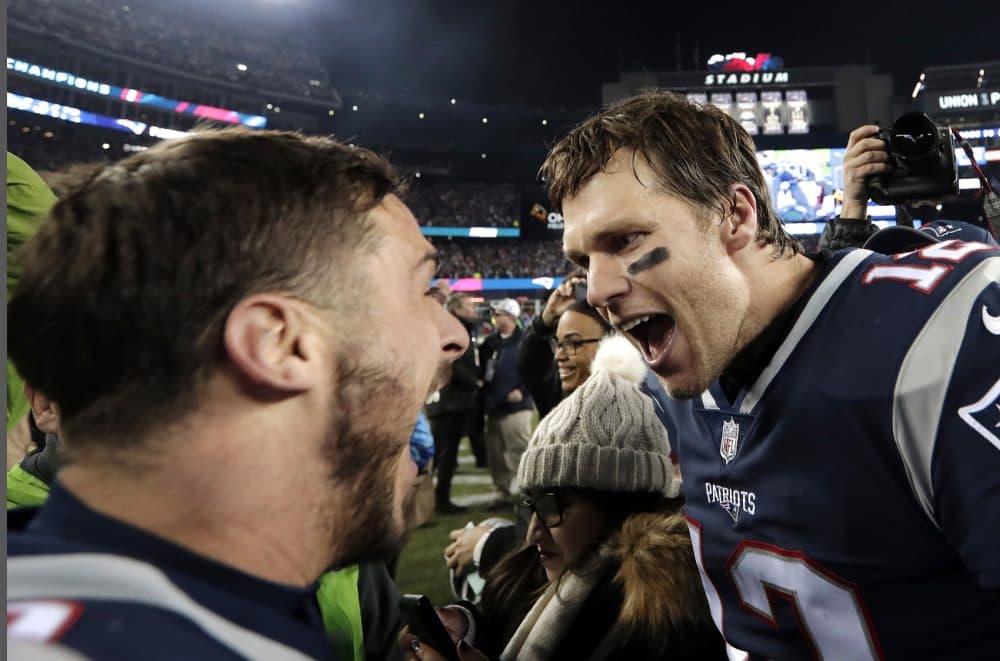 New England Patriots wide receiver Danny Amendola, left, and quarterback Tom Brady celebrate their victory over the Jacksonville Jaguars in the AFC championship NFL football game, Sunday, Jan. 21, 2018, in Foxborough, Mass. (AP Photo/David J. Phillip)