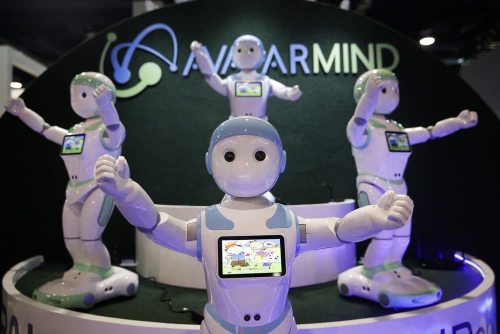 AvatarMind's iPal companion robots are displayed at CES International, Wednesday, Jan. 10, 2018, in Las Vegas. (AP Photo/Jae C. Hong)