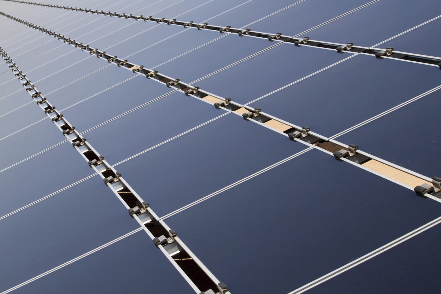 FILE- This April 20, 2011, file photo shows some of the 30,000 solar panels that make up the Public Service Company of New Mexico's new 2-megawatt photovoltaic array in Albuquerque, N.M. Some in the U.S. solar-power industry are hoping a decision this week by President Donald Trump doesnt bring on an eclipse. Companies that install solar-power systems for homeowners and utilities are bracing for Trumps call on whether to slap tariffs on imported panels. The solar business in the U.S. has boomed in recent years, driven by falling prices for panels, thanks in part to cheap imports. That has made solar power more competitive with electricity generated from coal and natural gas. (AP Photo/Susan Montoya Bryan,File)