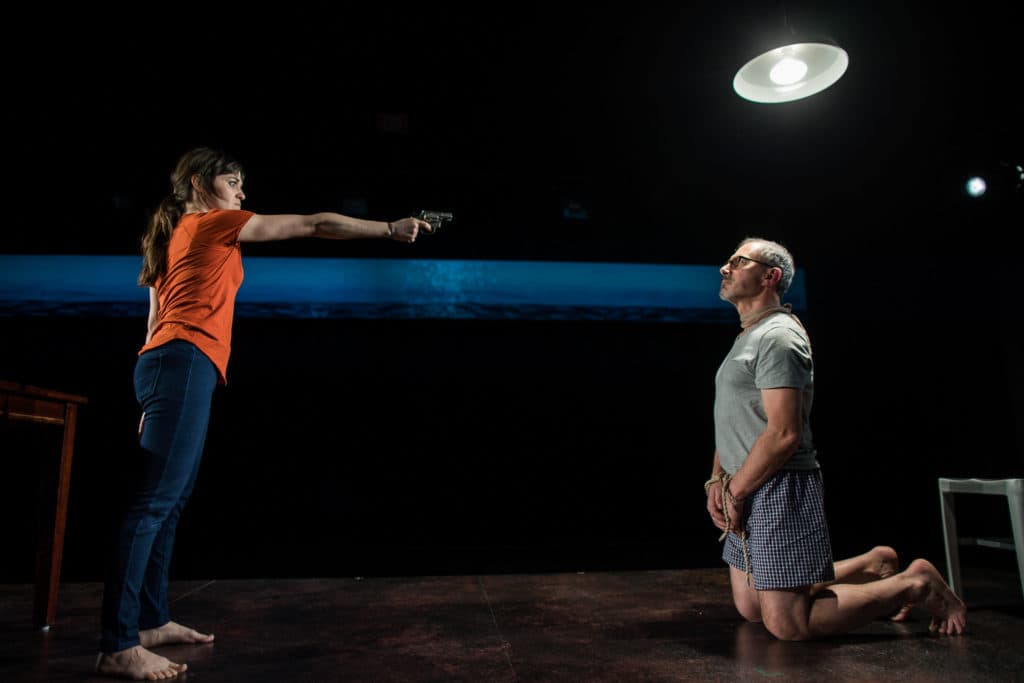 Flora Diaz as Paulina Salas and Mark Torres as Roberto Miranda in Commonwealth Shakespeare Company's production of "Death and the Maiden." (Courtesy Nile Hawver/Nile Scott Shots)