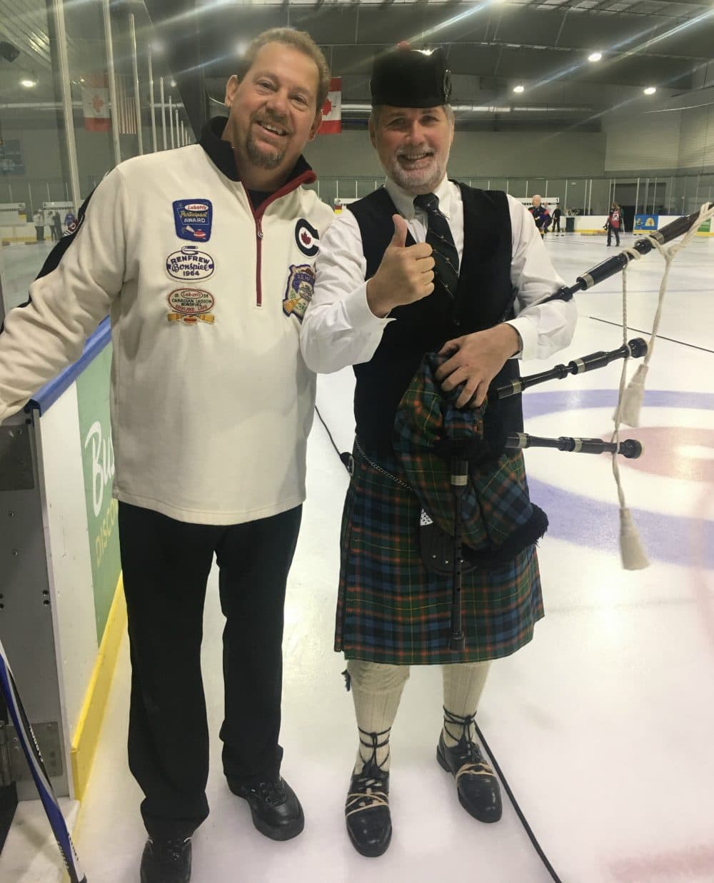 Bernie, left, with bagpiper, Paul Macleish, who plays at championship games and other special Tampa Bay Curling Club events. (Courtesy Karen Hooper)