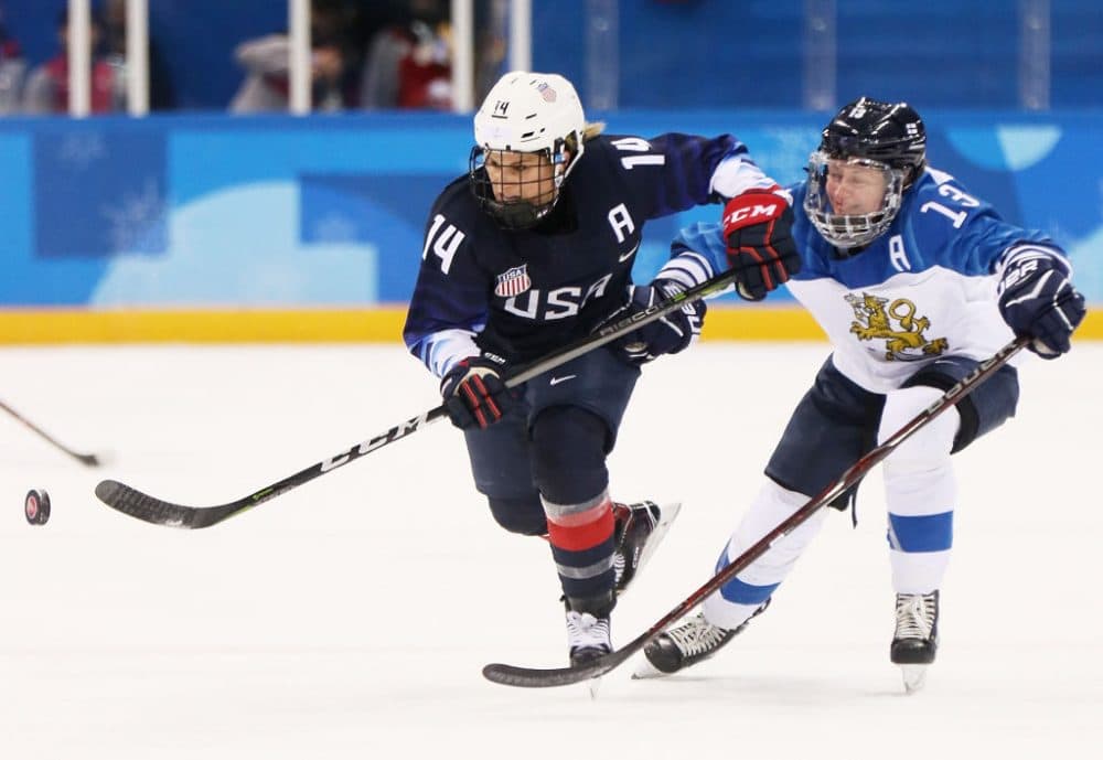 Brianna Decker (left) of the United States and Riikka Valila of Finland battle for the puck during an Olympics semifinal matchup on Feb. 19, 2018 in Pyeongchang-gun, South Korea. (Jamie Squire/Getty Images)