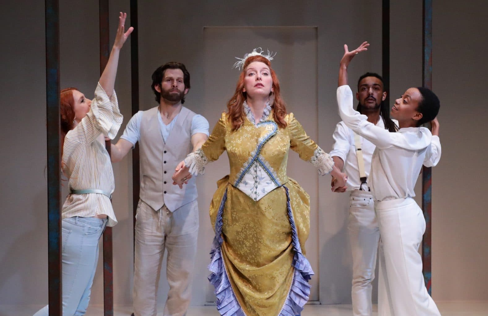 Caroline Lawton as Orlando, surrounded by the cast. (Courtesy Mark S. Howard)