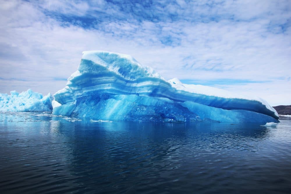 Calved icebergs from the nearby Twin Glaciers are seen floating on the water on July 30, 2013 in Qaqortoq, Greenland. (Joe Raedle/Getty Images)
