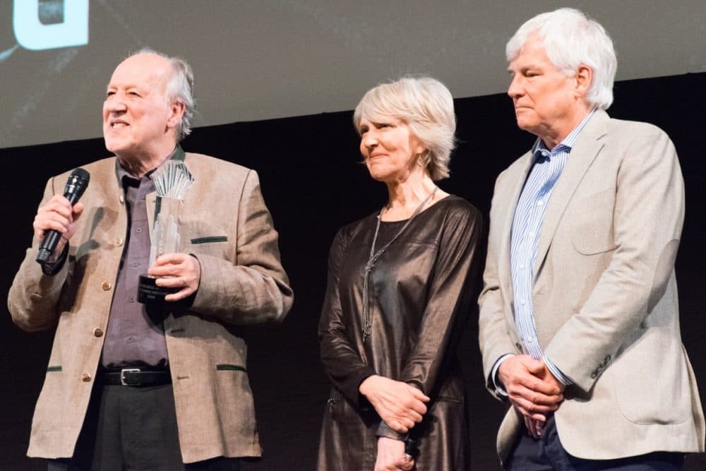 Werner Herzog receives the Coolidge Award on Thursday, Feb. 8, on stage with the theater's executive director Katherine Tallman and board chair Michael Maynard. (Courtesy A. Gallagher Dixon)