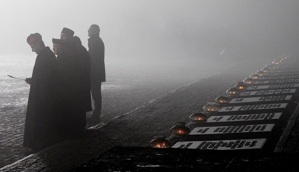 Representatives of various religious congregations gather at the former Nazi German concentration and extermination camp Auschwitz II-Birkenau, on International Holocaust Remembrance Day in Oswiecim, Poland, Saturday, Jan. 27, 2018. (Czarek Sokolowski/AP)