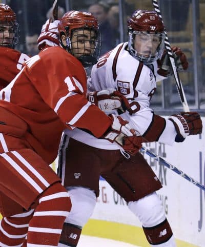 Boston University forward Jordan Greenway, left, keeps Harvard forward Ryan Donato away from the puck during the Beanpot tournament on Feb. 5, 2018. Greenway and Donato are on the U.S.