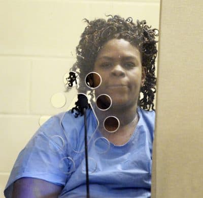 Latarsha Sanders, 43, is arraigned in Brockton District Court on two counts of murder on Tuesday. (Marc Vasconcellos /The Enterprise via AP, Pool)