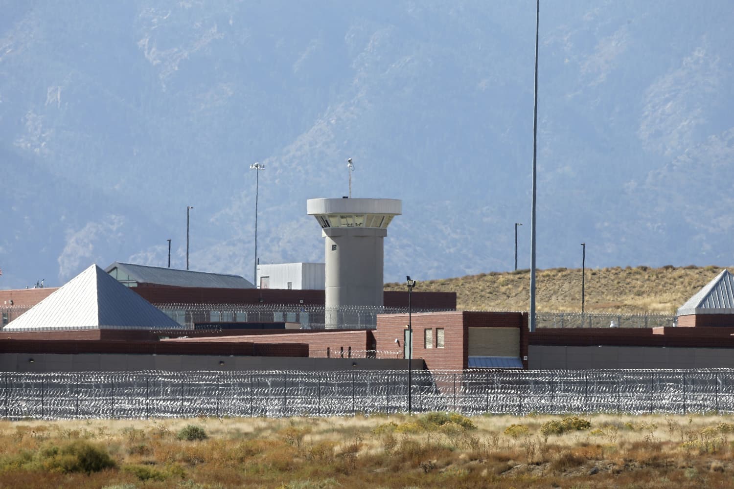 FILE - In this Oct. 15, 2015 file photo, a guard tower looms over a federal prison complex which houses a Supermax facility outside Florence, in southern Colorado. Attorney General Jeff Sessions has directed the nations federal prosecutors to pursue the most serious charges possible against the vast majority of suspects, a reversal of Obama-era policies that is sure to send more people to prison and for far longer terms. The move, announced in a policy memo sent to U.S. attorneys late on May 10, has been expected from Sessions. (AP Photo/Brennan Linsley,File)