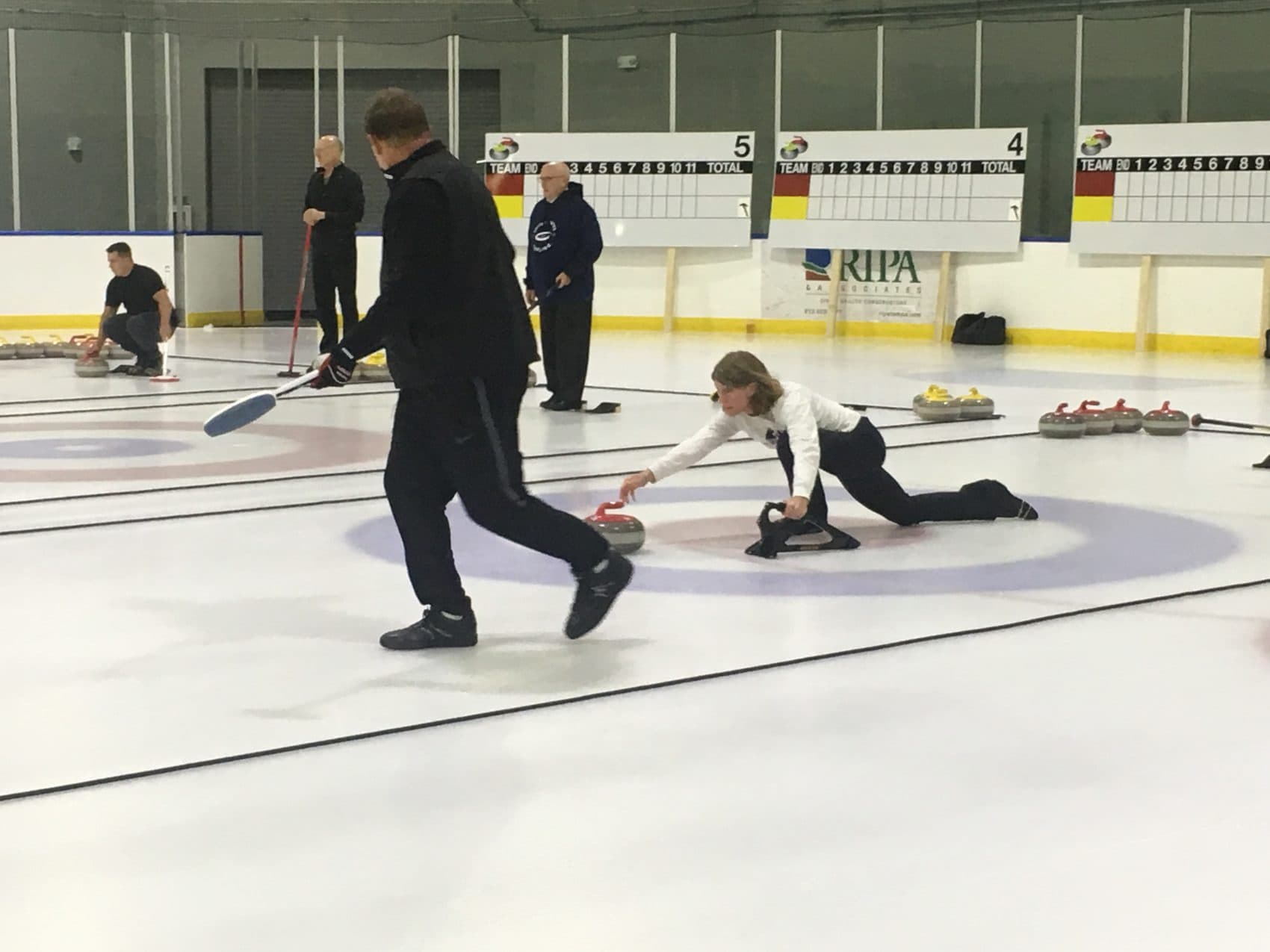 Members of the Tampa Bay Curling Club in action. (Courtesy Karen Hooper)