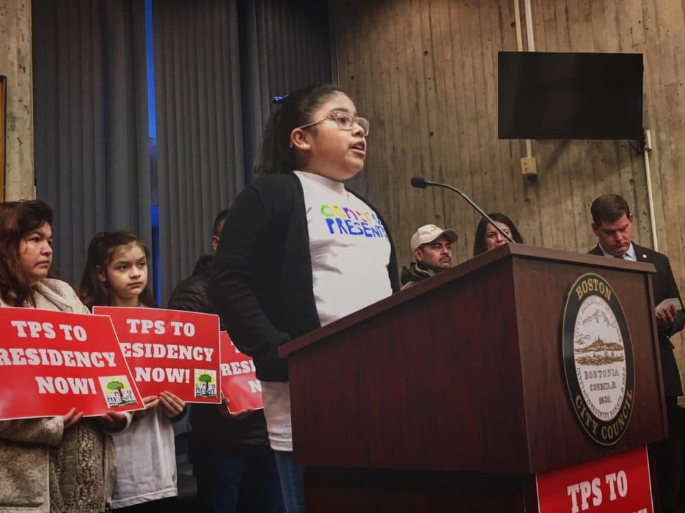 Ten-year-old Gabriella Martinez is a U.S. citizen. Her mother is from El Salvador and is in the country with TPS. Martinez spoke at City Hall the day after the Trump administration announced the end of the temporary immigration program for El Salvador. (Shannon Dooling/WBUR)