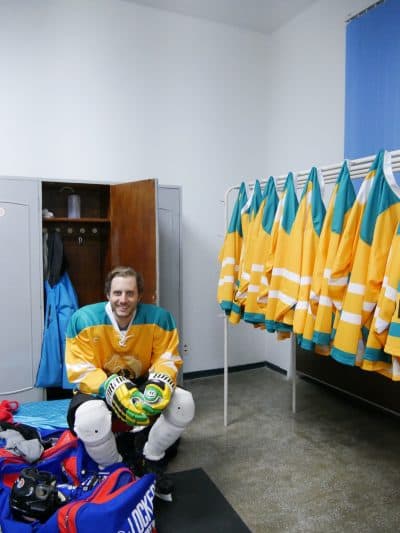Alex sits fully dressed before a hockey game in North Korea. (Courtesy Alex Frecon)