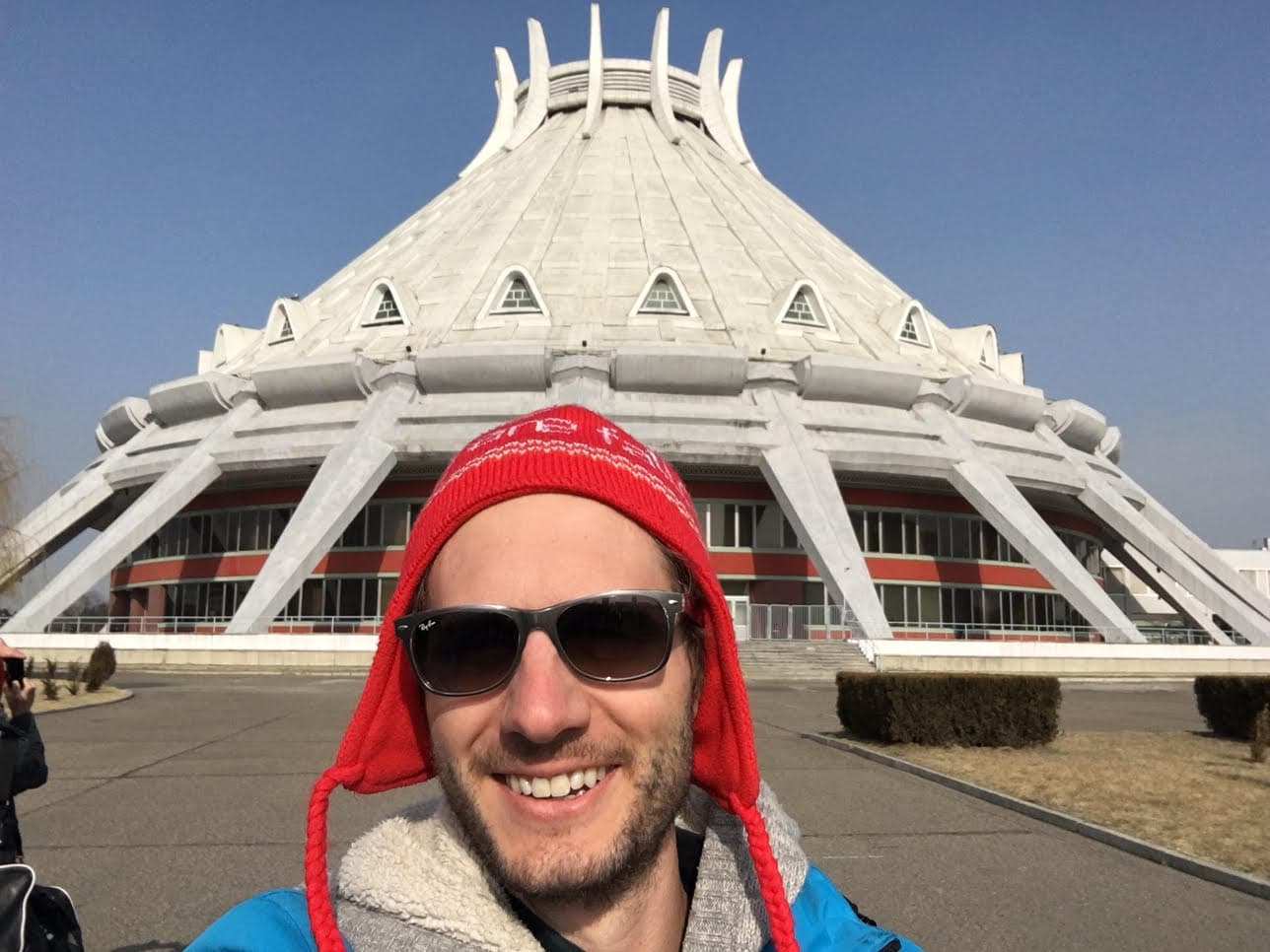 Alex in front of the North Korean national hockey rink. (Courtesy Alex Frecon)