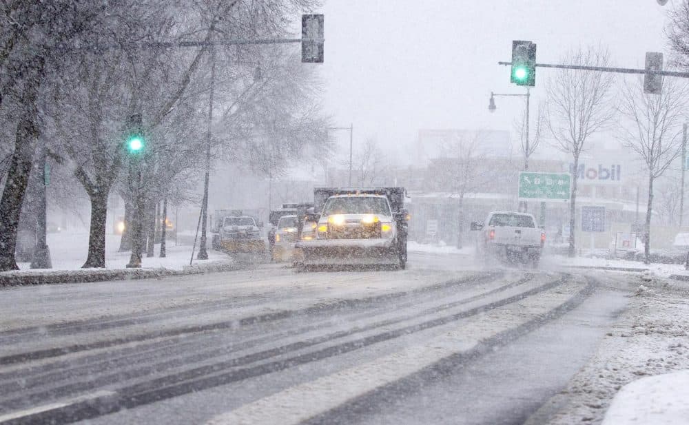 Snowplows clear Route 3 in Cambridge during the Tuesday morning commute. (Robin Lubbock/WBUR)