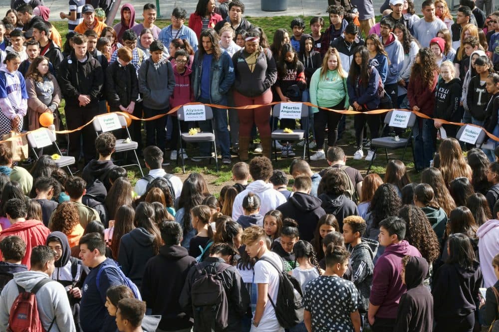 Students from Eagle Rock High School in Los Angeles hold a moment of silence for victims of the Marjory Stoneman Douglas High School shooting on Wednesday. (Richard Vogel)