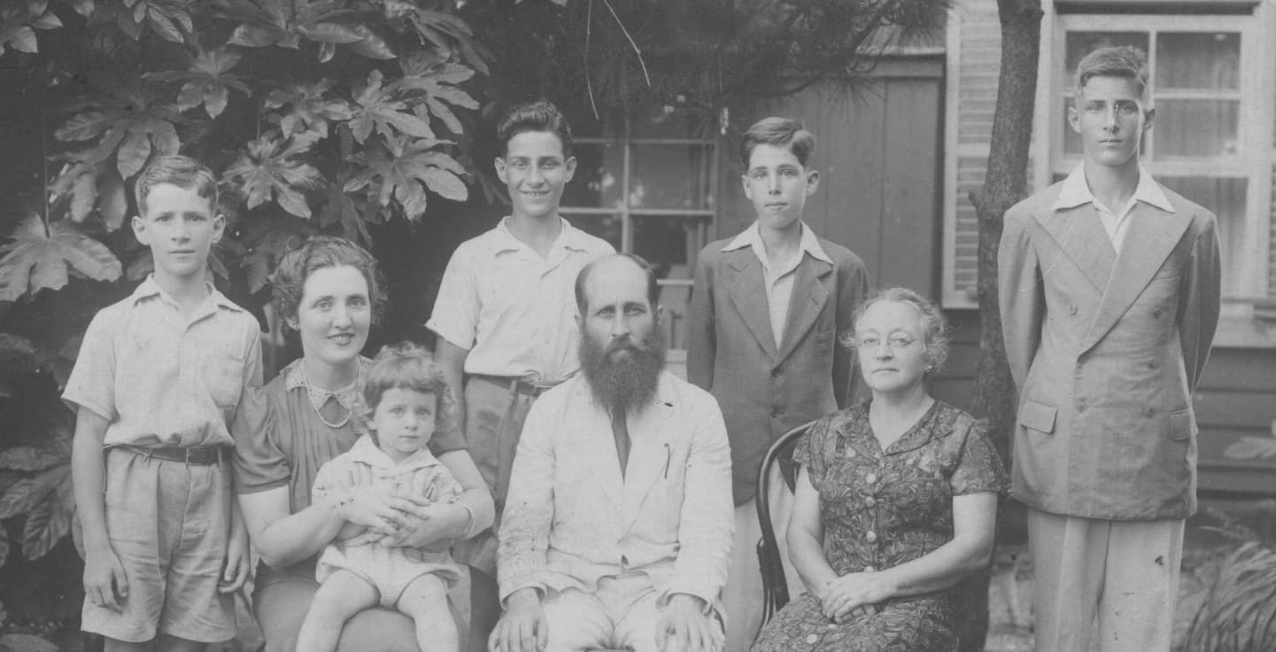 Isaac Shapiro (far left) stands with (left to right) Jacob, Ariel and Joseph, and (sitting, left to right) his mother Lydia, Michael, his father Constantine and Ms. Vaisman in 1941 in Yokohama, Japan. (Courtesy of Isaac Shapiro)
