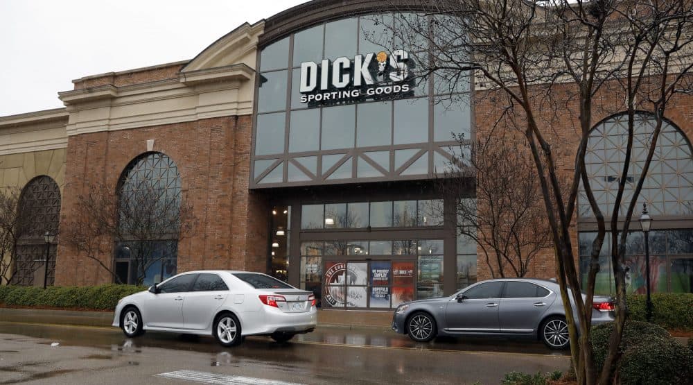 A sign for Dick's Sporting Goods store is displayed at the store Thursday, March 1, 2018, in Madison, Miss. Dick's Sporting Goods and Walmart took steps Wednesday to restrict gun sales, adding two retail heavyweights to the growing rift between corporate America and the gun lobby. (Rogelio V. Solis/AP)