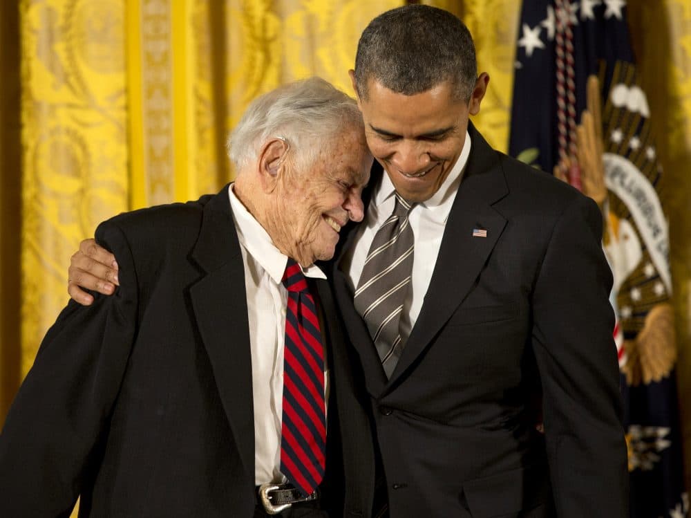 President Obama hugs Dr. T. Berry Brazelton as he presents him with a 2012 Citizens Medal on Feb. 15, 2013. (Jacquelyn Martin/AP)