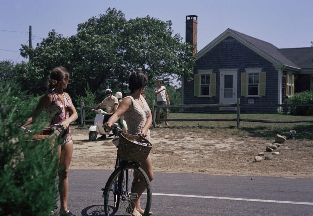 A month after the Chappaquiddick tragedy tourists pause outside the house in Chappaquiddick Island, Martha's Vineyard, where a cook-out was held on July 18, 1969, a reunion for campaign workers from Robert Kennedy's presidential campaign. Kennedy left the party with Mary Jo Kopechne, who died that night when Sen. Edward Kennedy drove a car off the Dyke Bridge. (AP)