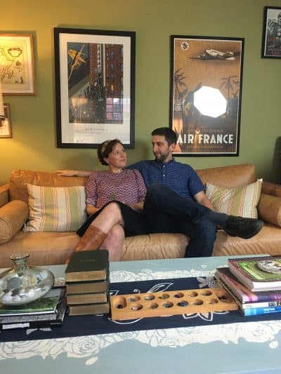 Nina Riggs and John Duberstein sit on the couch that Nina bought. (Courtesy Brettne Bloom)