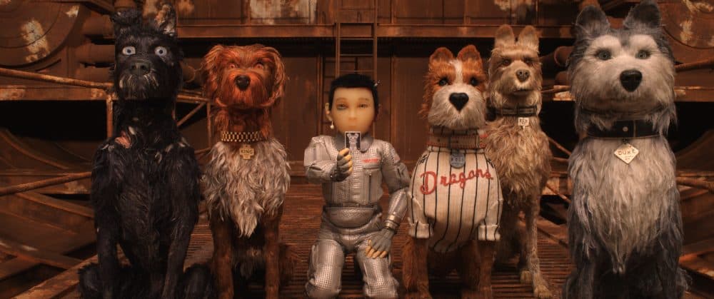Atari Kobayashi (Koyu Rankin) surrounded by his crew of canine pals. (Courtesy Fox Searchlight Pictures)