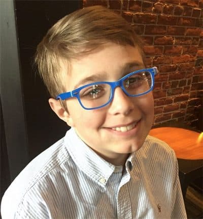 Jack Hogan, 13, underwent surgery to treat his vision impairment with gene therapy. Here he's seen on Wednesday, the day after the procedure. (Courtesy of the Hogan family)