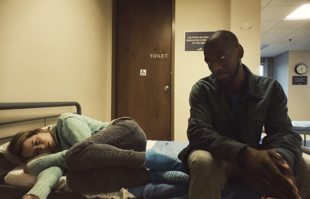 Claire Foy as Sawyer Valentini and Jay Pharoah as Nate Hoffman in &quot;Unsane.&quot; (Courtesy Fingerprint Releasing/Bleecker Street)