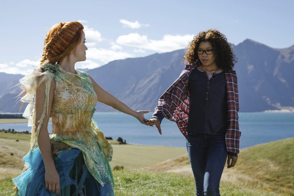 This image released by Disney shows Reese Witherspoon, left, and Storm Reid in a scene from "A Wrinkle In Time." (Atsushi Nishijima/Disney via AP)