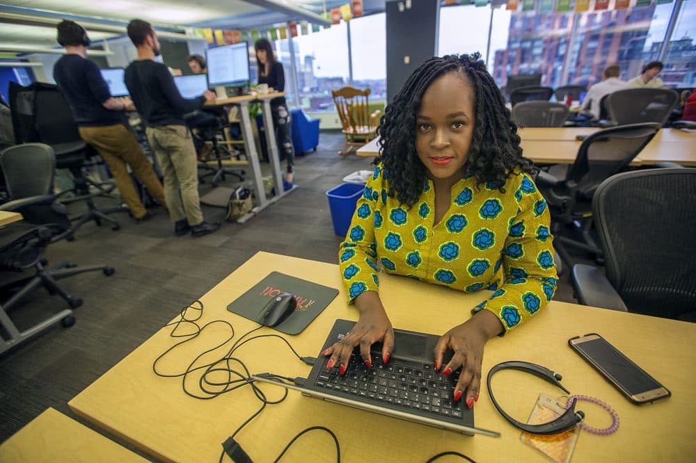 Diane Basemera started Amooti in 2016. &quot;I wanted to have the whole Amazon experience but with African products,&quot; she says as she works out of Hub Boston Coworking Space for Startups in Downtown Boston. (Jesse Costa/WBUR)