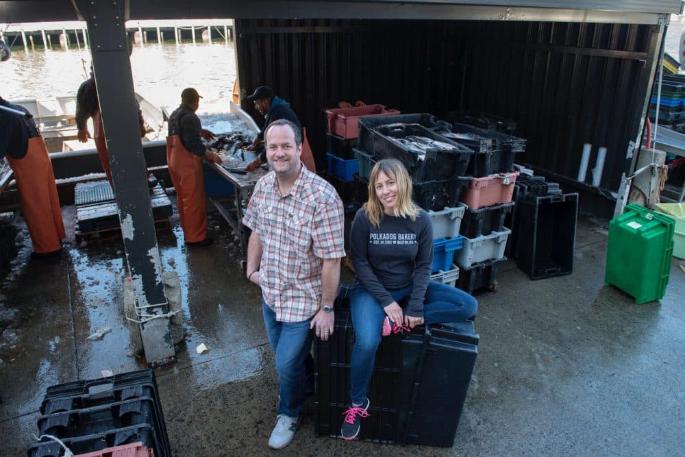 Deb Suchman and her partner, Rob, at Boston Fish Pier, where Polkadog's kitchen is located. (Courtesy of Deb Suchman)