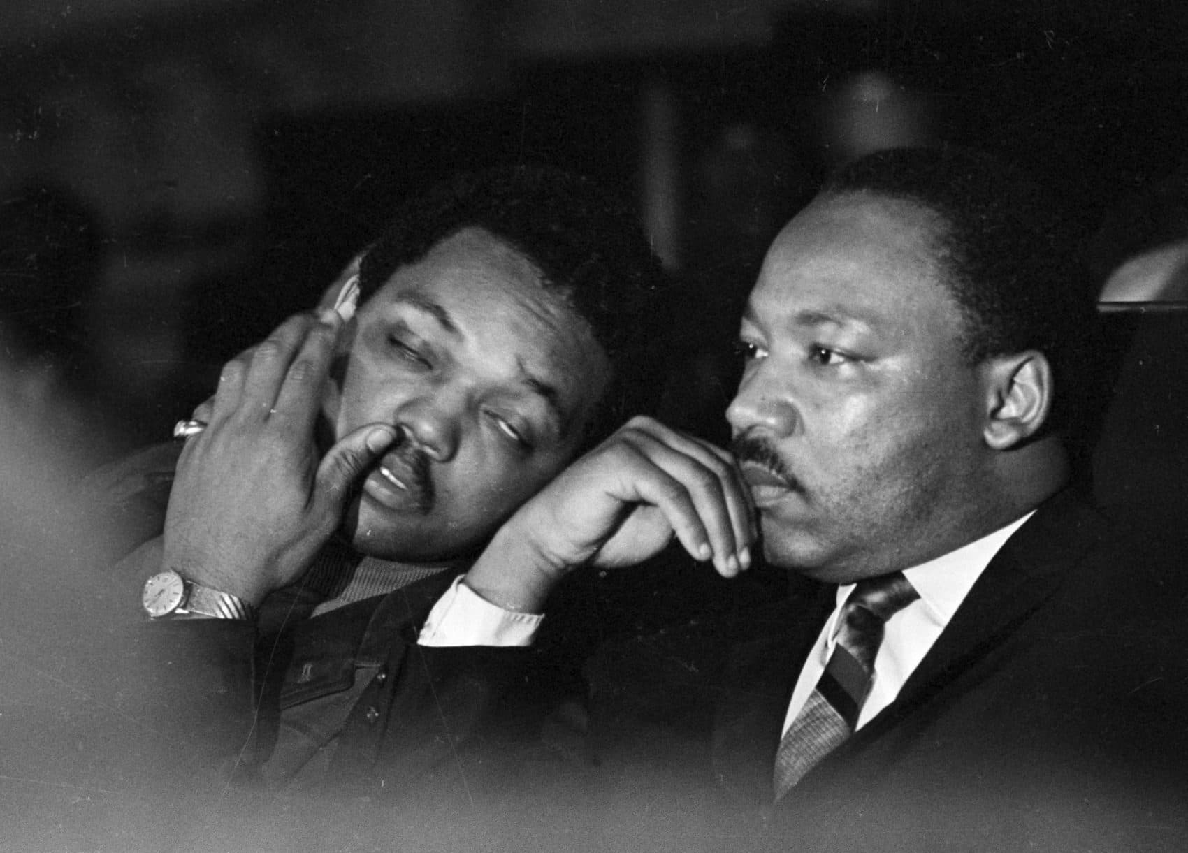 Dr. Martin Luther King, Jr. is seen here with the Rev. Jesse Jackson, left, just prior to his final public appearance to address striking Memphis sanitation workers on April 4, 1968. King was assassinated later that day outside his motel room. (Charles Kelly/AP)