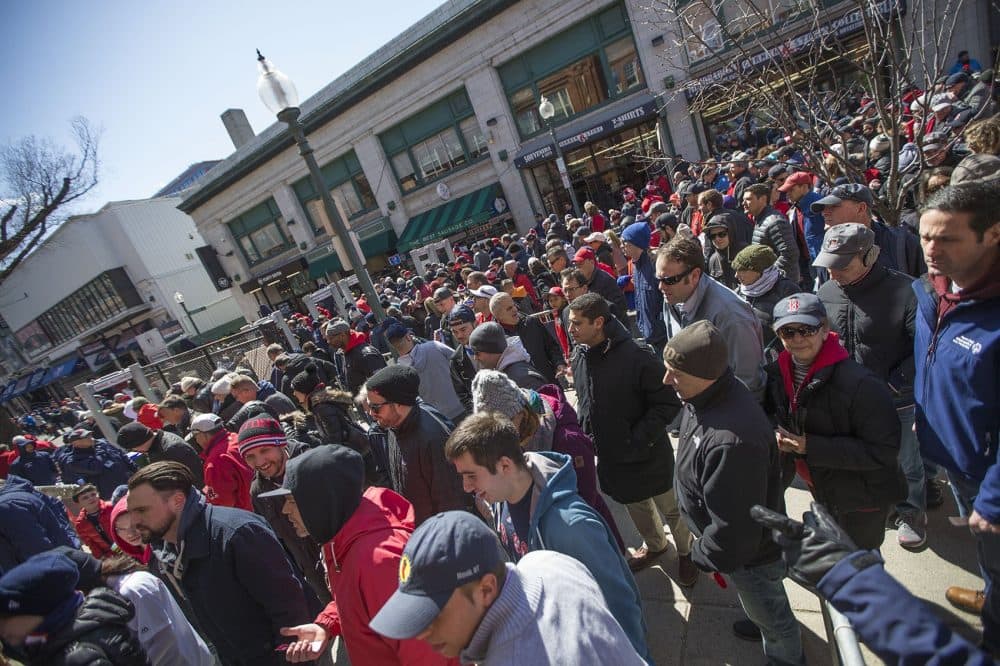 Red Sox fans file down Brookline Avenue for Opening Day. (Jesse Costa/WBUR)